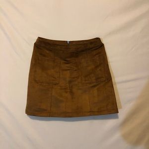 Brown faux suede mini skirt.